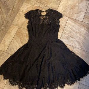 Very girly and fun little black dress!